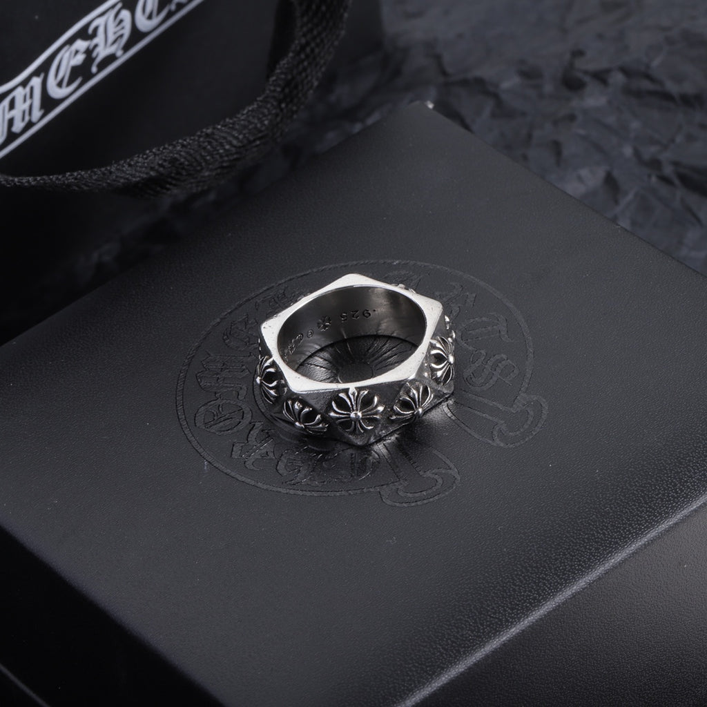 Chrome accessory ring pair, silver-tone bands with floral engraving
