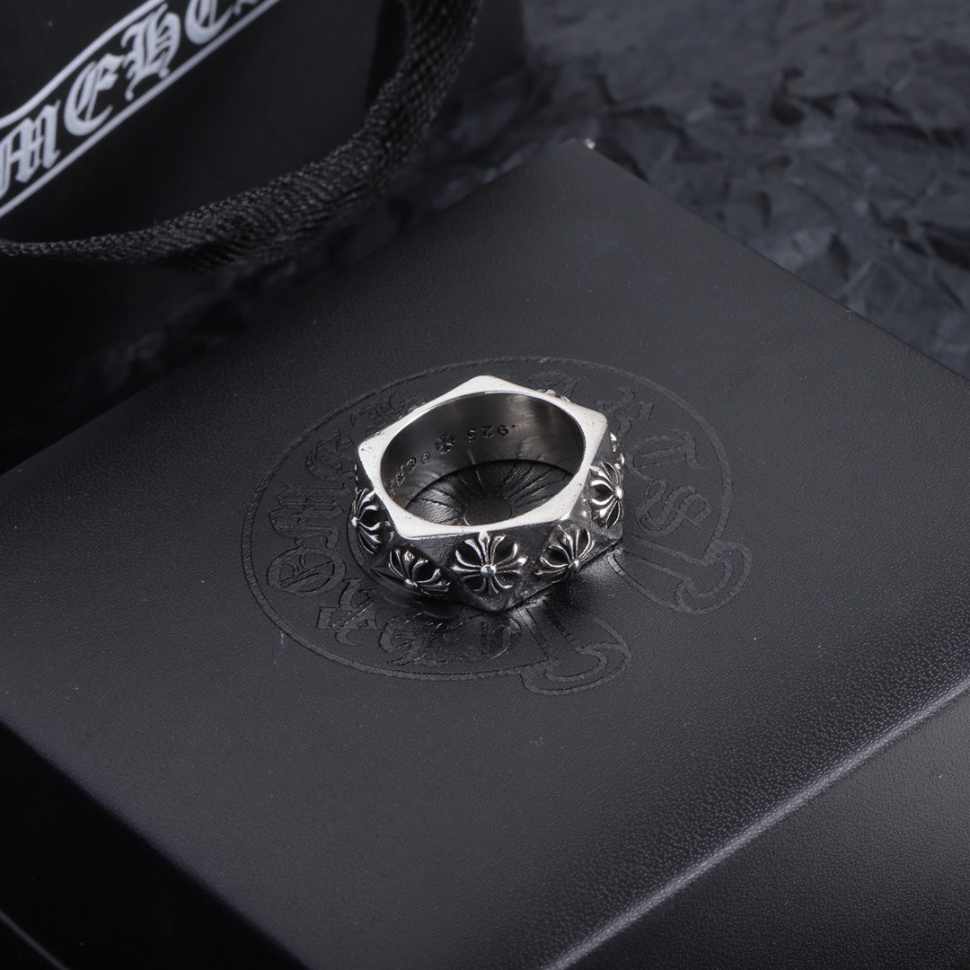 Chrome accessory ring pair, silver-tone bands with floral engraving