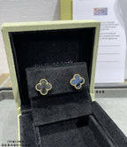 Van Cleef & Arpels quatrefoil stud earrings in box, black enamel with gold edging
