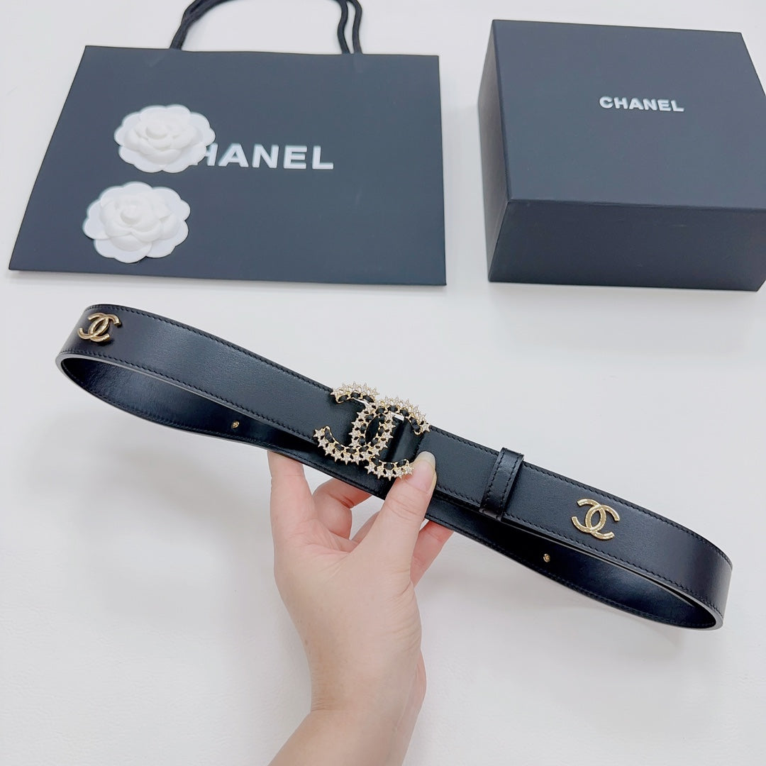 Chanel belt dark blue leather with gold-toned CC buckle and adjustable keeper