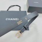 Chanel dark blue leather belt with gold-tone logo near buckle and CC pull tab