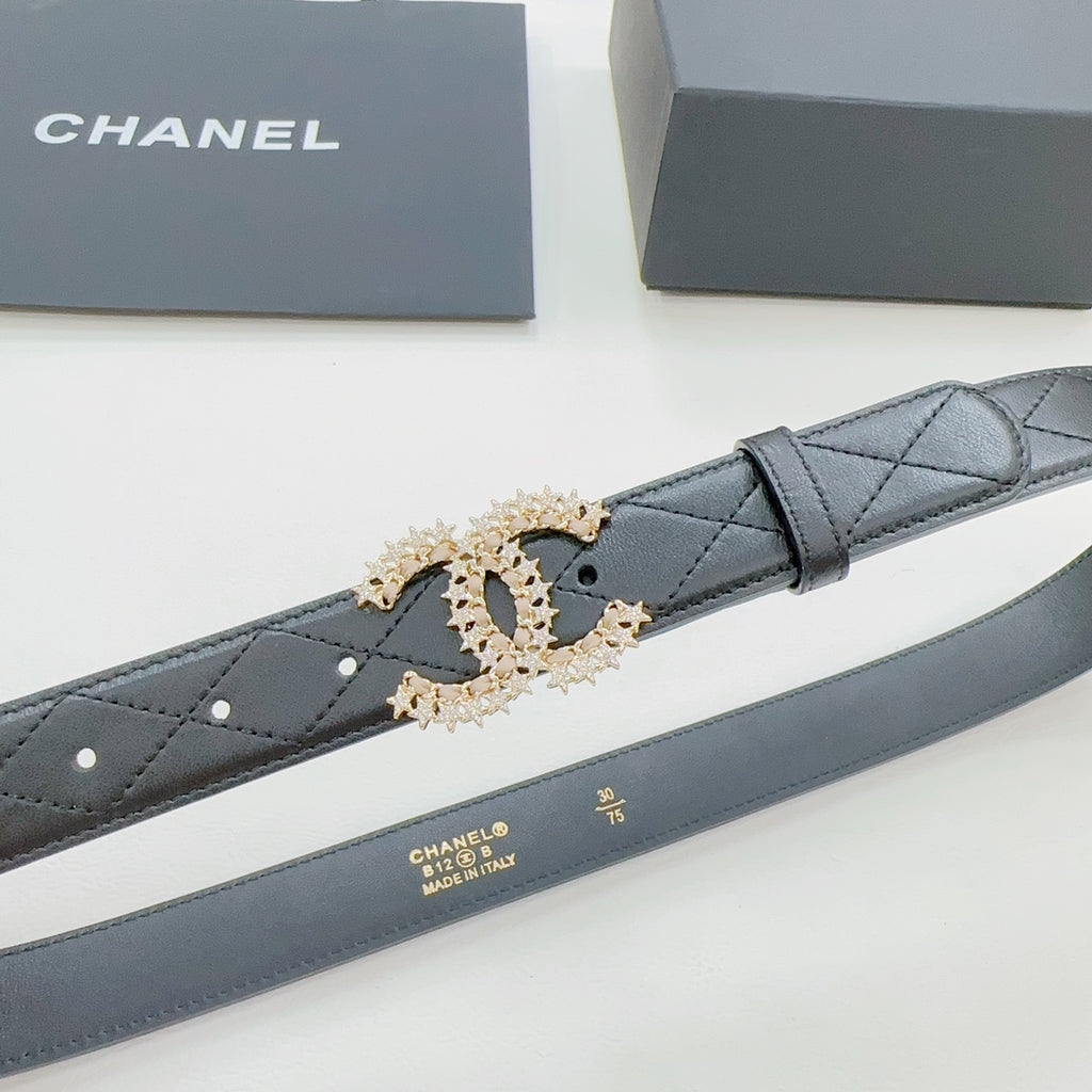 Chanel dark blue leather belt close-up of gold-tone CC buckle and stitching