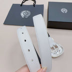 White leather belt strap with multiple eyelet holes and ornate silver buckle detail