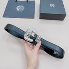 Chrome belt with dark blue leather strap, silver buckle and visible row of adjustment holes