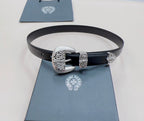 Chrome belt with dark blue strap, silver buckle set with three decorative side plates