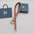 Brown leather belt featuring ornate silver buckle with decorative side plates