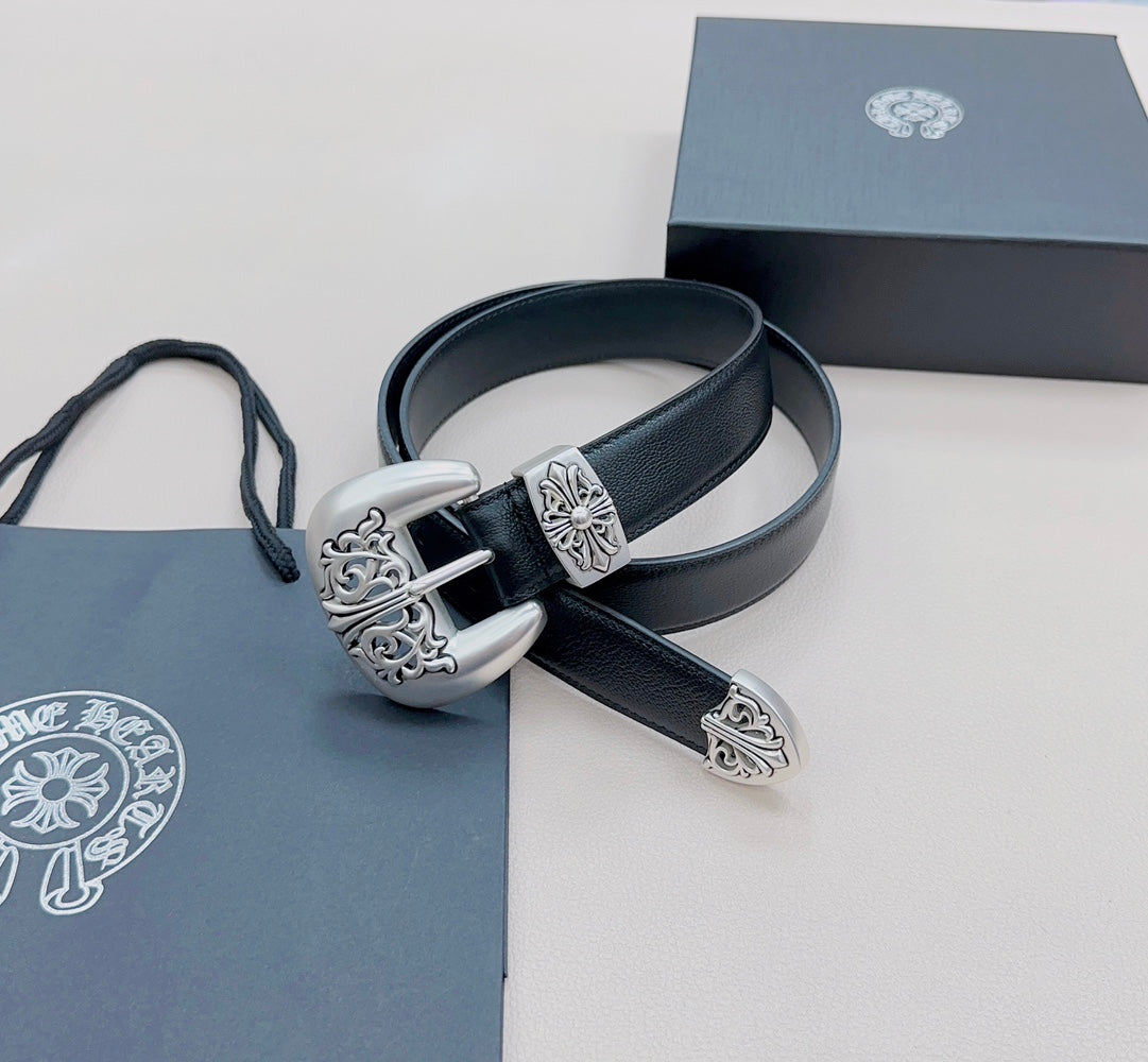 Leather belt with dark blue strap and silver ornate buckle; matching silver details on strap ends.