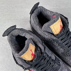Denim sneakers close-up: tongue and sock collar with red logo patch.