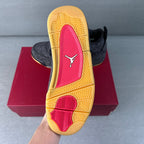 Shoe outsole view with yellow rubber tread and red-and-pink heel insert.