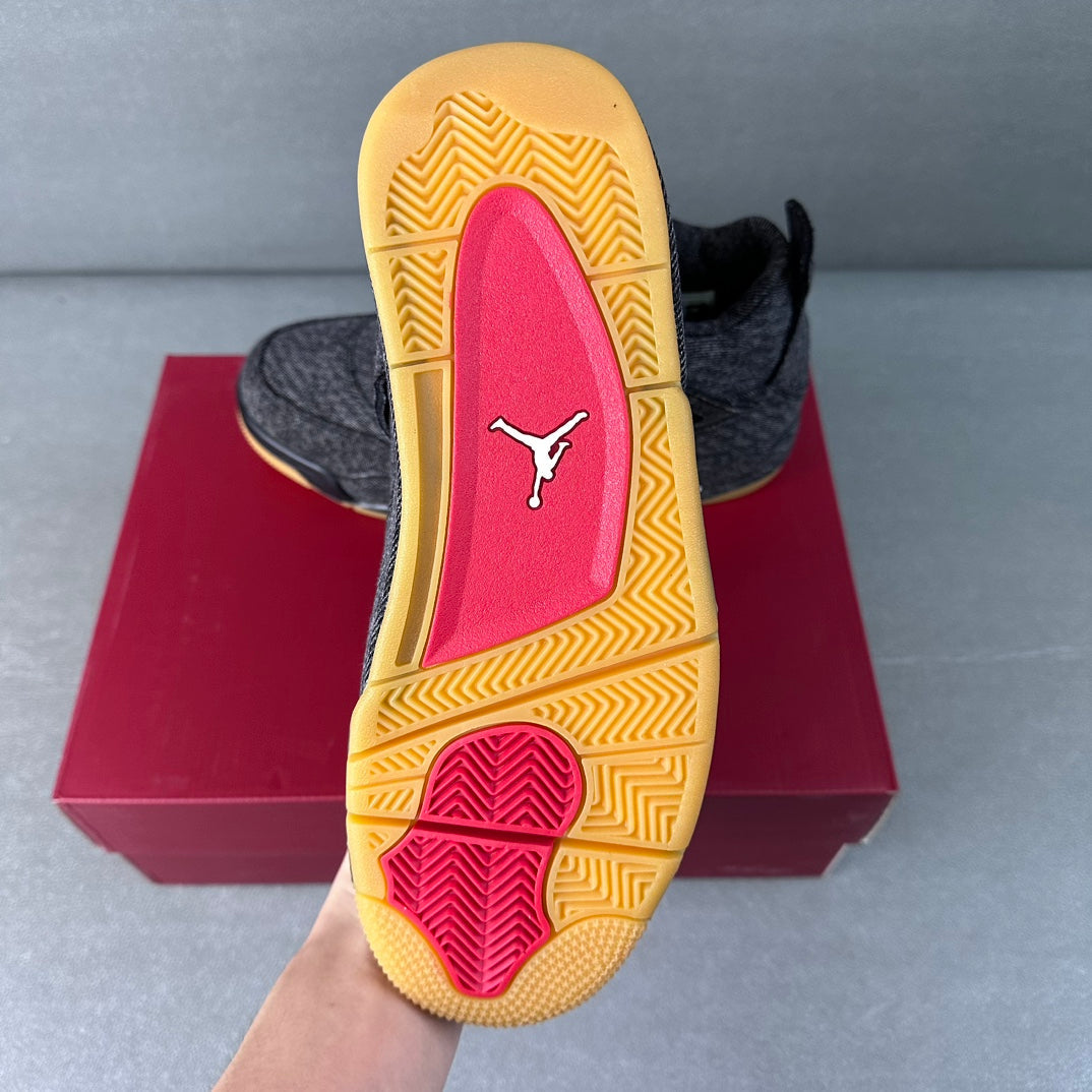 Shoe outsole view with yellow rubber tread and red-and-pink heel insert.