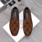 Versace luxury slip-on shoes in brown with repeating Greek key pattern, black lining.