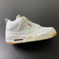 White high-top sneakers with gum sole and red accent window detail