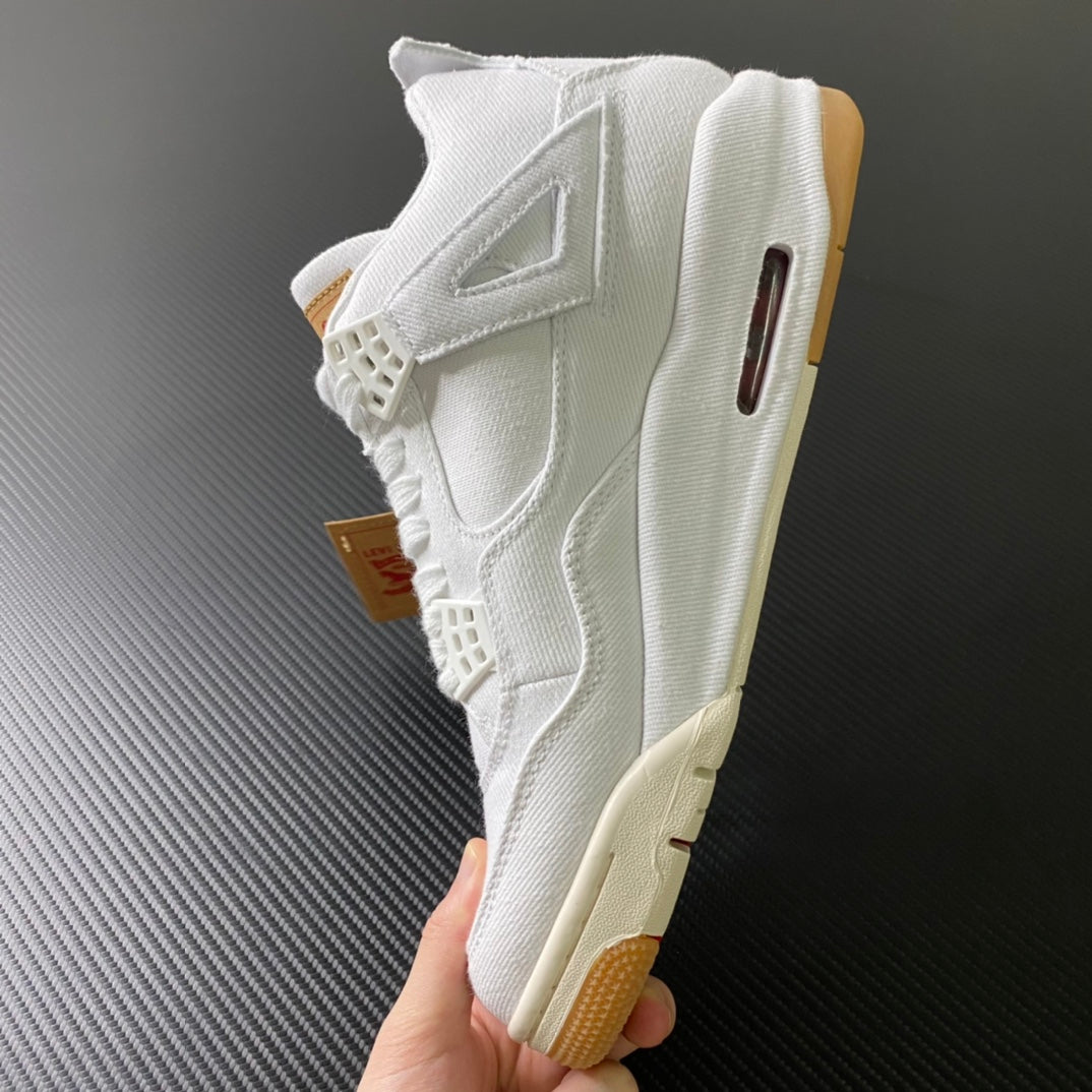 White high-top sneakers with side strap and vent cutouts, gum sole