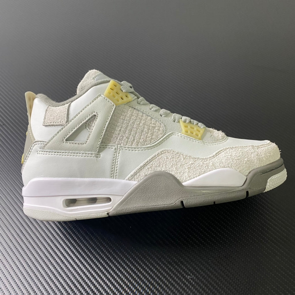Mid-top sneaker in off-white leather with beige suede panels and yellow lace straps