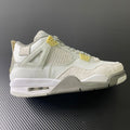 Mid-top sneaker in off-white leather with beige suede panels and yellow lace straps
