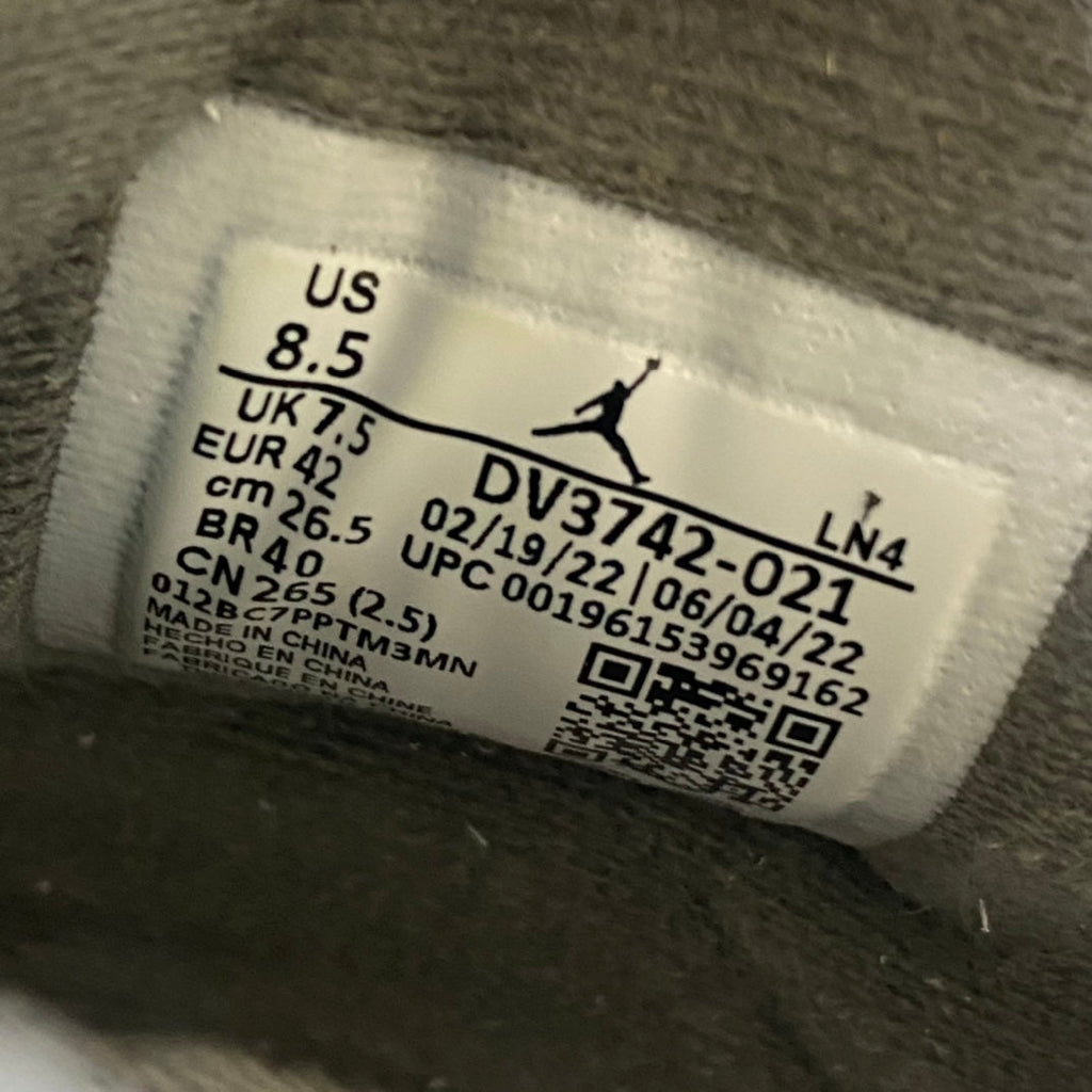 Shoe size tag inside sneaker showing US 8.5 and style code DV3742-021