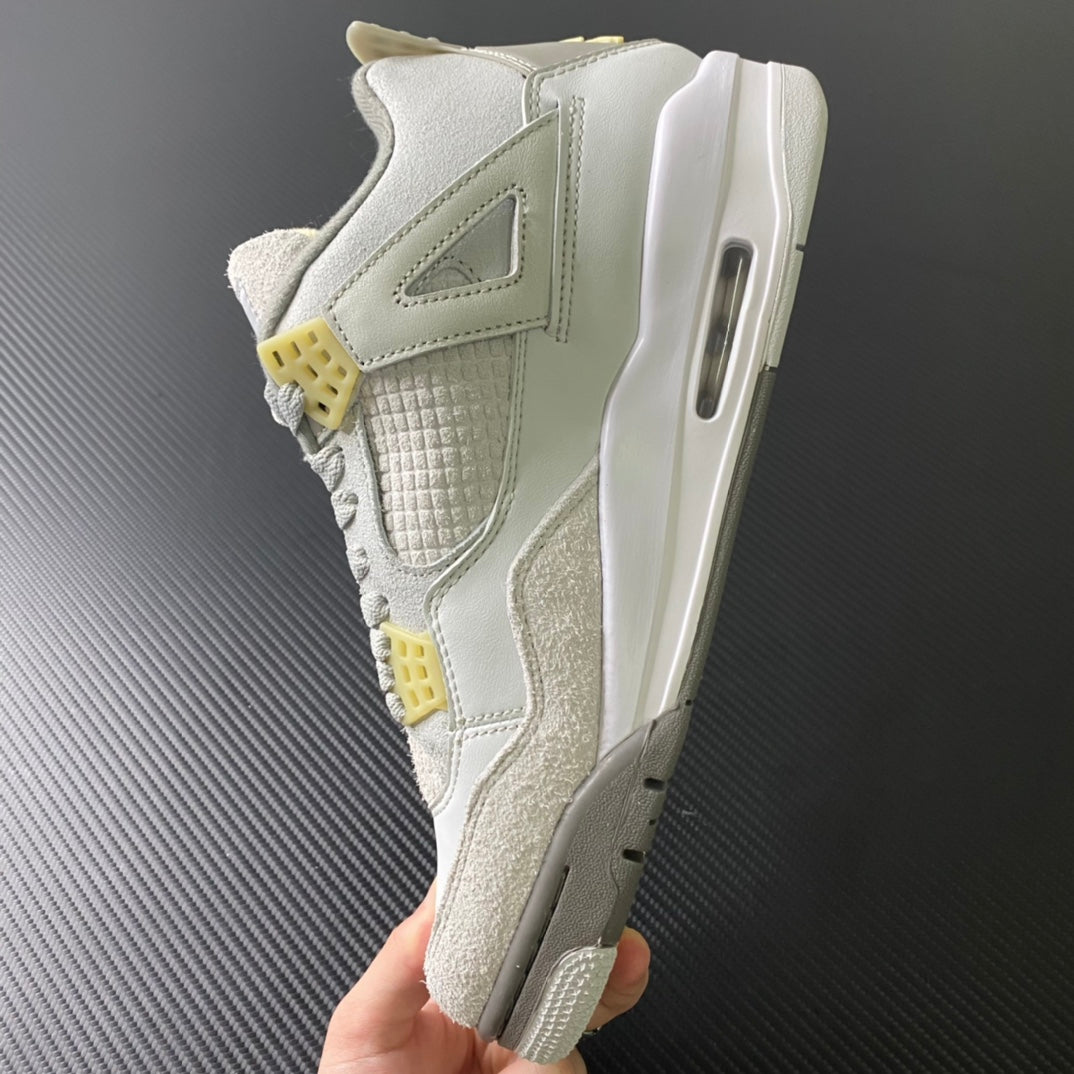 Mid-top sneaker profile with visible air window, off-white leather, beige suede, yellow tabs