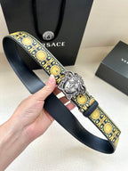 Navy patterned leather belt with gold oval motif and silver Medusa buckle