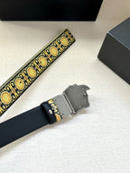 Navy leather belt with gold baroque trim and silver-tone buckle