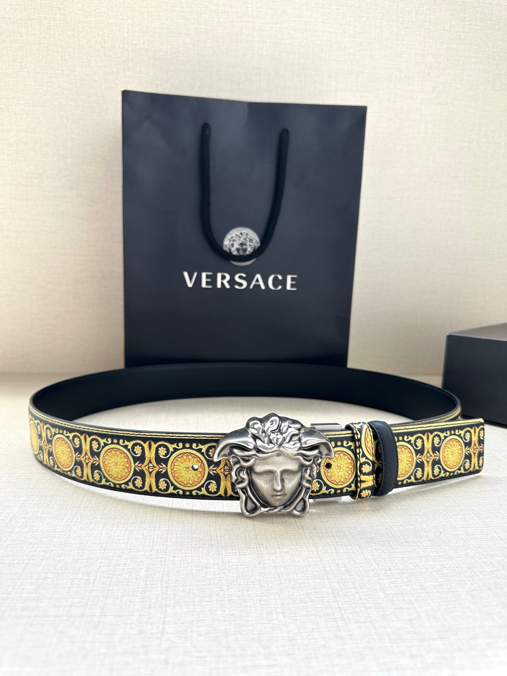 Navy leather belt with gold baroque pattern and silver Medusa buckle