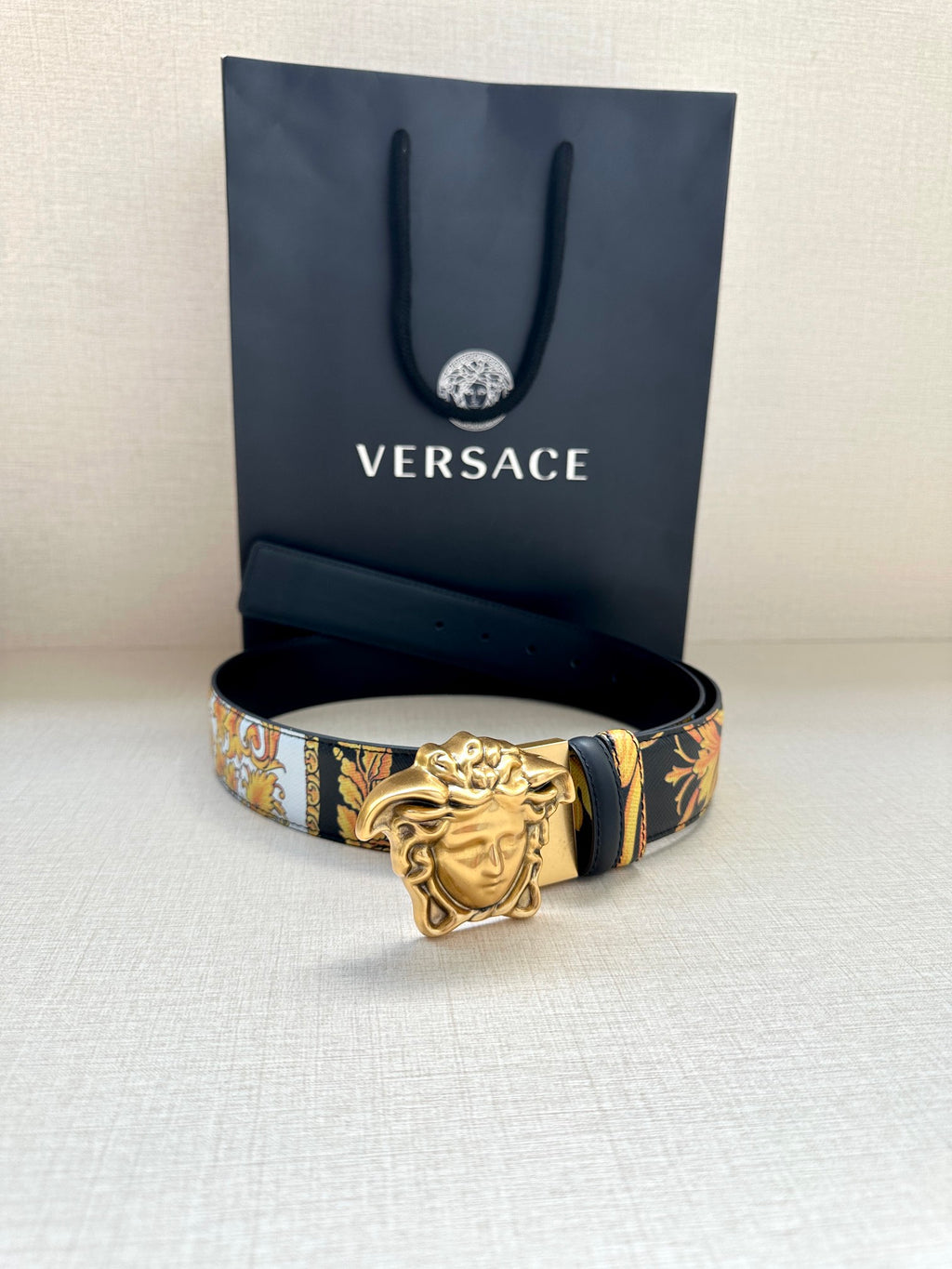 Versace belt with dark blue baroque pattern strap and gold-toned Medusa buckle