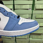 Light blue and white high-top sneakers with black swoosh and lace area detail.