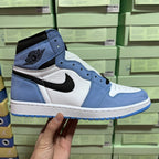 High-top sneakers in light blue, white, and black with Nike swoosh detail.