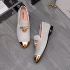 Luxury Versace loafers in white sparkle with gold crest ornament and metallic bottom trim