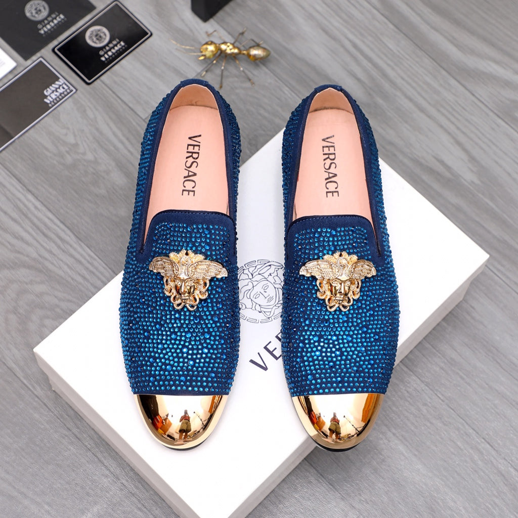 Blue rhinestone Versace loafers with gold emblem and glossy toe trim, slip-on