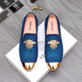 Blue rhinestone Versace loafers with gold emblem and glossy toe trim, slip-on