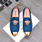 Blue rhinestone Versace loafers with gold emblem and glossy toe trim, slip-on