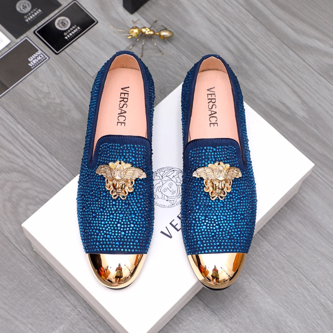 Blue rhinestone Versace loafers with gold emblem and glossy toe trim, slip-on