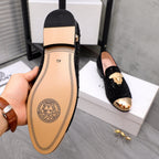 Loafer insole view with tan lining and stitched perforation detailing