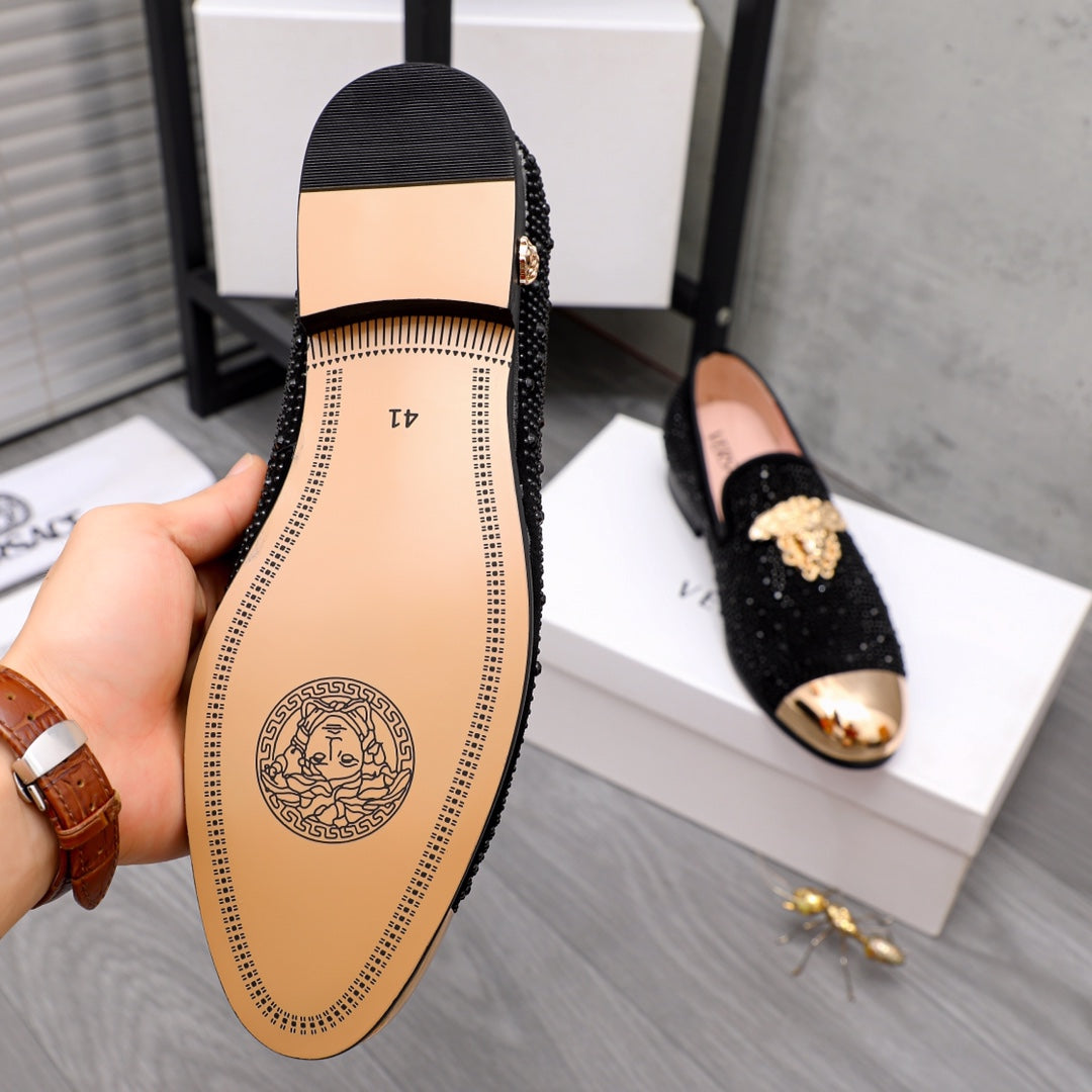 Loafer insole view with tan lining and stitched perforation detailing