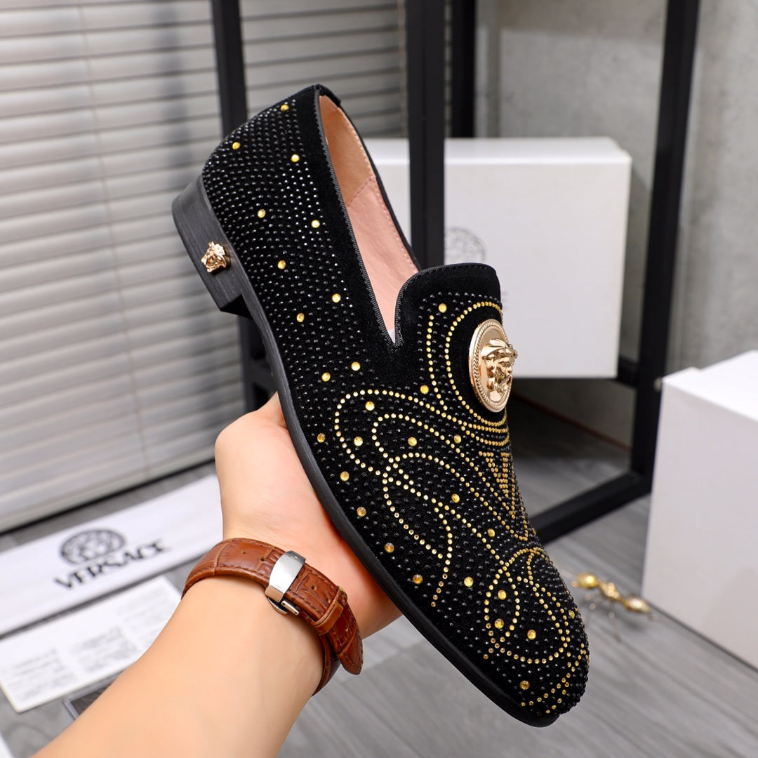 Versace black embellished loafer with gold medallion and studded decorative pattern
