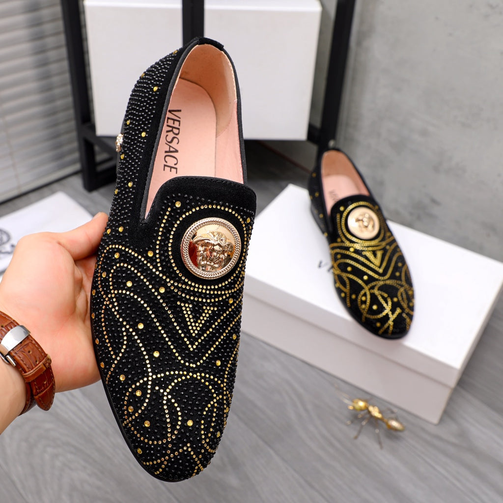 Versace black jeweled slip-on loafer with gold crest medallion on vamp