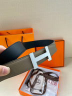 Hermes reversible leather belt with silver H buckle, gray and dark navy straps