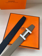 Hermes reversible leather belt with silver H buckle, gray and dark navy straps