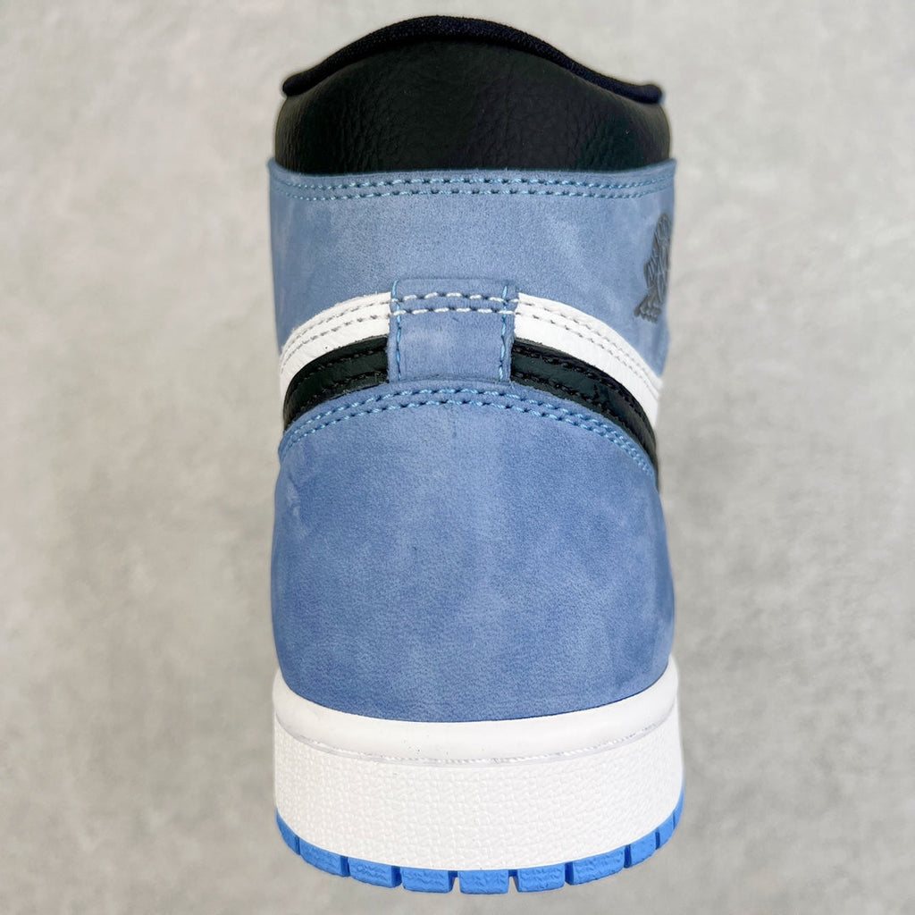 High-top sneaker heel with blue suede upper, white midsole, and black collar trim