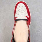 High-top sneaker toe and lace area with red leather and white perforated panels