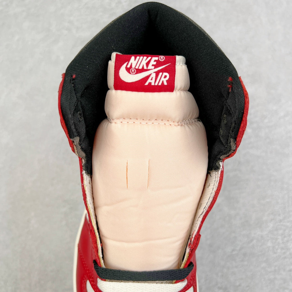 High-top sneaker interior with Nike Air label and padded off-white lining