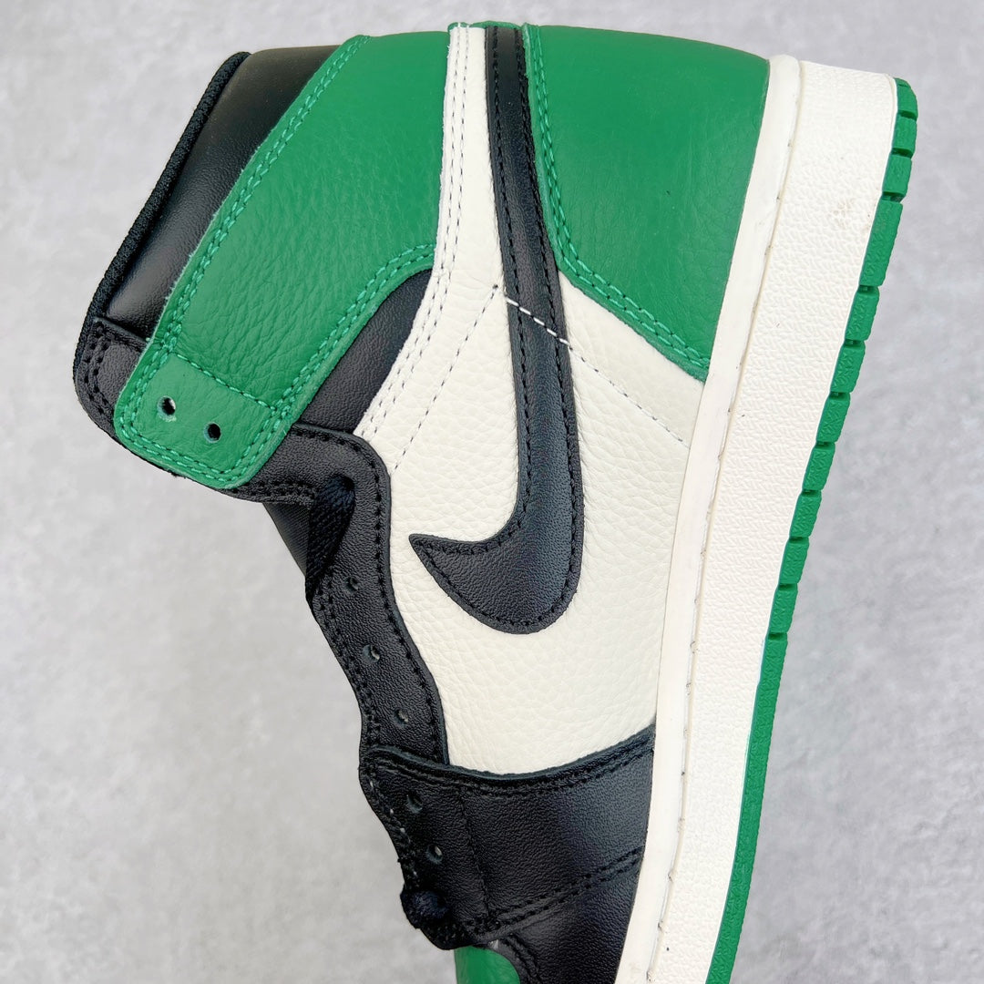 High-top sneaker side view with white leather, green collar, and black Swoosh