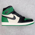 High-top sneakers in white, black, and green with Swoosh and green toe guard
