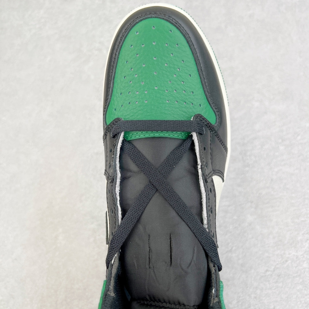 High-top sneaker toe and lace area with dark upper, green inner panel, and black laces