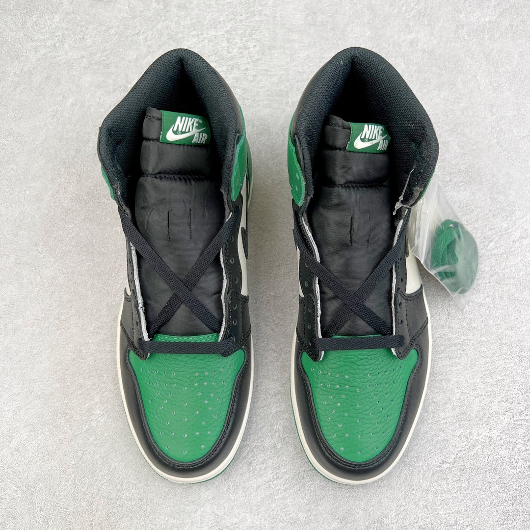 Pair of high-top sneakers with green and black uppers, cross-laced front, padded tongues