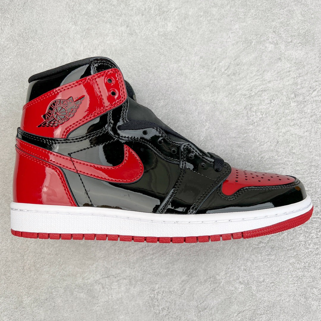 High-top patent leather sneaker, black and red with Nike swoosh and white sole.