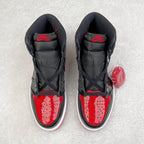 Pair of black high-top sneakers with red perforated toe box and Nike Air on tongue.