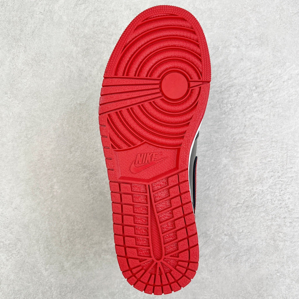 Red rubber outsole with Nike logo and tread pattern.