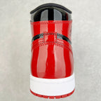 High-top sneaker heel in glossy red with black back strap and white sole.