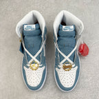 Denim blue high-top sneakers with white laces, Nike Air tongue label, gold chain charms